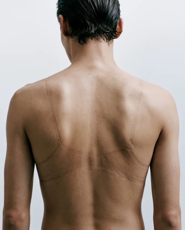 Bare back portrait with wet hair